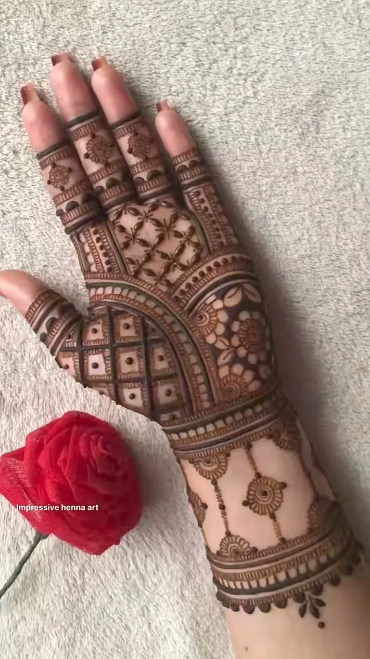 Intricate Front Hand Mehndi Design #18